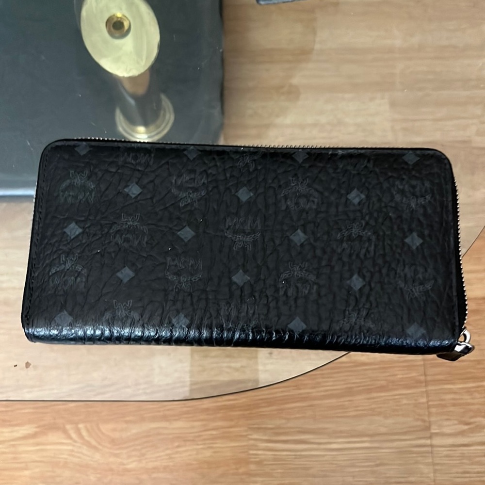 McM black zipper wallet.